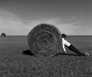 Rodney Smith, Man Leaning Against Hay Bale, Alberta, Canada, 2004 Rodney Smith, Man Leaning Against Hay Bale, Alberta, Canada, 2004